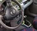 Синий Мазда 2, объемом двигателя 1.4 л и пробегом 255 тыс. км за 3800 $, фото 6 на Automoto.ua