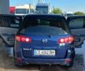 Синий Мазда 2, объемом двигателя 1.4 л и пробегом 255 тыс. км за 3800 $, фото 3 на Automoto.ua