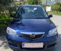 Синий Мазда 2, объемом двигателя 1.4 л и пробегом 225 тыс. км за 3950 $, фото 1 на Automoto.ua