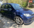 Синий Мазда 2, объемом двигателя 1.4 л и пробегом 225 тыс. км за 3950 $, фото 1 на Automoto.ua