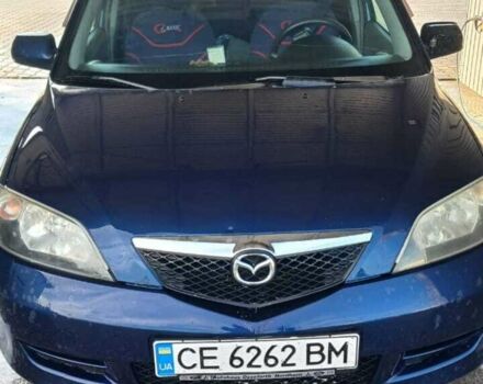 Синій Мазда 2, об'ємом двигуна 1.4 л та пробігом 255 тис. км за 3800 $, фото 5 на Automoto.ua