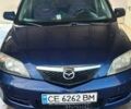 Синій Мазда 2, об'ємом двигуна 1.4 л та пробігом 255 тис. км за 3800 $, фото 5 на Automoto.ua