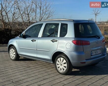 Синий Мазда 2, объемом двигателя 1.4 л и пробегом 90 тыс. км за 4200 $, фото 5 на Automoto.ua