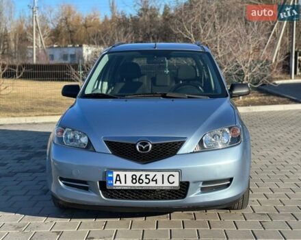 Синий Мазда 2, объемом двигателя 1.4 л и пробегом 90 тыс. км за 4200 $, фото 9 на Automoto.ua