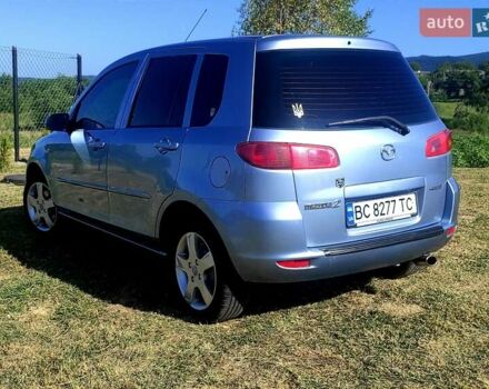 Синій Мазда 2, об'ємом двигуна 1.4 л та пробігом 193 тис. км за 4800 $, фото 4 на Automoto.ua