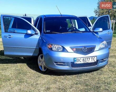 Синій Мазда 2, об'ємом двигуна 1.4 л та пробігом 193 тис. км за 4800 $, фото 3 на Automoto.ua