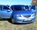 Синій Мазда 2, об'ємом двигуна 1.4 л та пробігом 193 тис. км за 4800 $, фото 3 на Automoto.ua