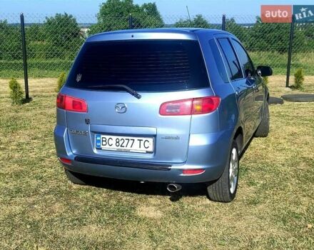 Синій Мазда 2, об'ємом двигуна 1.4 л та пробігом 193 тис. км за 4800 $, фото 5 на Automoto.ua