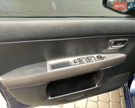 Синий Мазда 2, объемом двигателя 1.4 л и пробегом 185 тыс. км за 5700 $, фото 16 на Automoto.ua