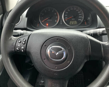 Синий Мазда 2, объемом двигателя 1.4 л и пробегом 185 тыс. км за 5700 $, фото 14 на Automoto.ua