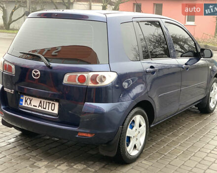 Синий Мазда 2, объемом двигателя 1.4 л и пробегом 185 тыс. км за 5700 $, фото 19 на Automoto.ua
