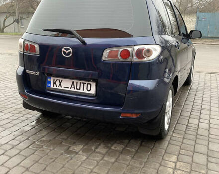 Синий Мазда 2, объемом двигателя 1.4 л и пробегом 185 тыс. км за 5700 $, фото 20 на Automoto.ua