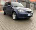 Синий Мазда 2, объемом двигателя 1.4 л и пробегом 185 тыс. км за 5700 $, фото 2 на Automoto.ua