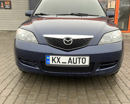 Синий Мазда 2, объемом двигателя 1.4 л и пробегом 185 тыс. км за 5700 $, фото 1 на Automoto.ua