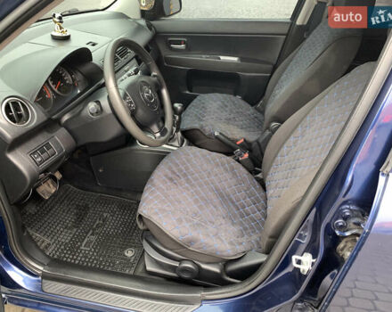 Синий Мазда 2, объемом двигателя 1.4 л и пробегом 185 тыс. км за 5700 $, фото 17 на Automoto.ua