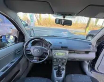 Синій Мазда 2, об'ємом двигуна 1.4 л та пробігом 108 тис. км за 3700 $, фото 4 на Automoto.ua