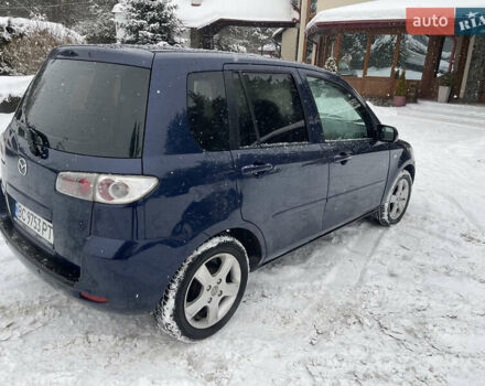 Синій Мазда 2, об'ємом двигуна 1.4 л та пробігом 178 тис. км за 3999 $, фото 16 на Automoto.ua