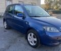 Синий Мазда 2, объемом двигателя 1.39 л и пробегом 207 тыс. км за 3200 $, фото 2 на Automoto.ua