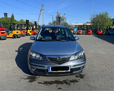 Синий Мазда 2, объемом двигателя 1.4 л и пробегом 135 тыс. км за 1899 $, фото 1 на Automoto.ua