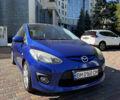 Синий Мазда 2, объемом двигателя 1.5 л и пробегом 154 тыс. км за 6000 $, фото 1 на Automoto.ua