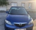 Синий Мазда 2, объемом двигателя 1.39 л и пробегом 207 тыс. км за 3200 $, фото 1 на Automoto.ua