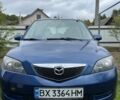 Синий Мазда 2, объемом двигателя 1.4 л и пробегом 204 тыс. км за 3200 $, фото 2 на Automoto.ua
