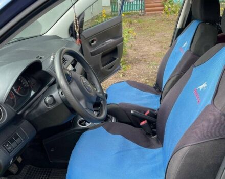 Синий Мазда 2, объемом двигателя 1.4 л и пробегом 204 тыс. км за 3200 $, фото 3 на Automoto.ua