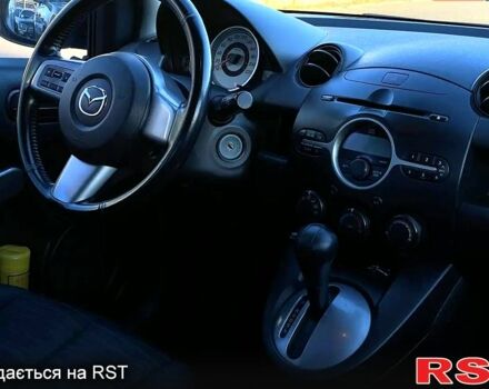 Синий Мазда 2, объемом двигателя 15 л и пробегом 191 тыс. км за 6300 $, фото 5 на Automoto.ua