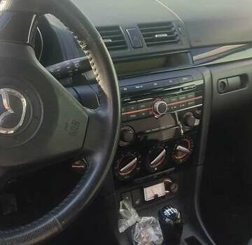 Синий Мазда 2, объемом двигателя 1.6 л и пробегом 222 тыс. км за 6000 $, фото 3 на Automoto.ua