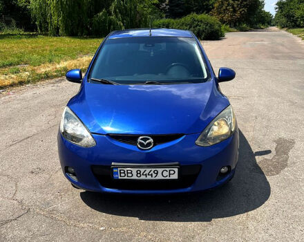 Синий Мазда 2, объемом двигателя 1.5 л и пробегом 185 тыс. км за 5500 $, фото 1 на Automoto.ua