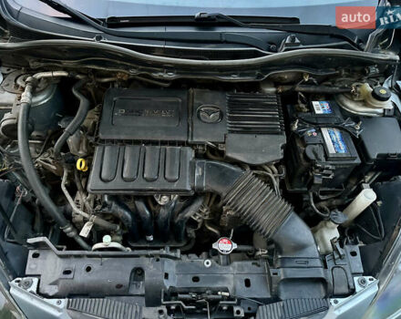 Синий Мазда 2, объемом двигателя 1.3 л и пробегом 182 тыс. км за 4500 $, фото 14 на Automoto.ua