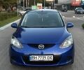 Синий Мазда 2, объемом двигателя 1.5 л и пробегом 155 тыс. км за 7000 $, фото 1 на Automoto.ua