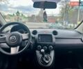 Синій Мазда 2, об'ємом двигуна 1.35 л та пробігом 271 тис. км за 5450 $, фото 20 на Automoto.ua