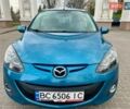 Синій Мазда 2, об'ємом двигуна 1.35 л та пробігом 271 тис. км за 5450 $, фото 1 на Automoto.ua