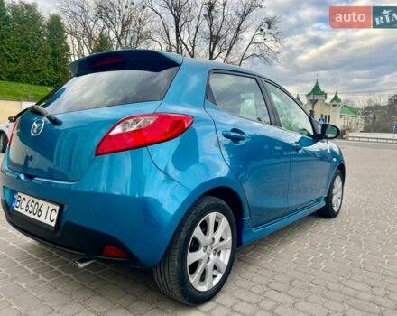 Синій Мазда 2, об'ємом двигуна 1.35 л та пробігом 271 тис. км за 5450 $, фото 7 на Automoto.ua