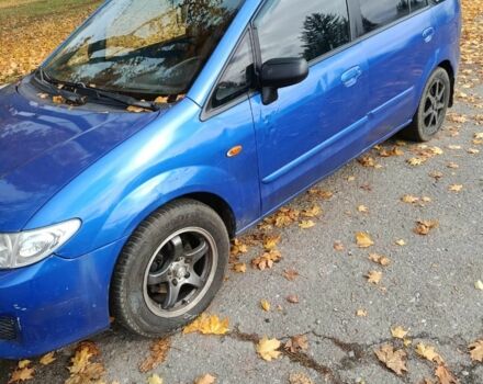 Синий Мазда 2, объемом двигателя 1.8 л и пробегом 318 тыс. км за 3000 $, фото 1 на Automoto.ua