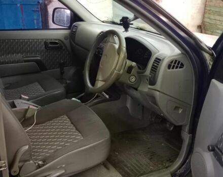 Синий Мазда 2, объемом двигателя 2.5 л и пробегом 160 тыс. км за 4000 $, фото 4 на Automoto.ua