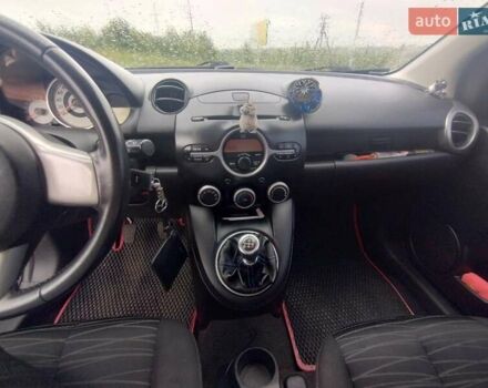 Синий Мазда 2, объемом двигателя 1.35 л и пробегом 191 тыс. км за 4800 $, фото 11 на Automoto.ua