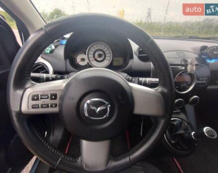 Синий Мазда 2, объемом двигателя 1.35 л и пробегом 191 тыс. км за 4800 $, фото 5 на Automoto.ua