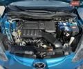 Синий Мазда 2, объемом двигателя 1.4 л и пробегом 139 тыс. км за 7500 $, фото 5 на Automoto.ua