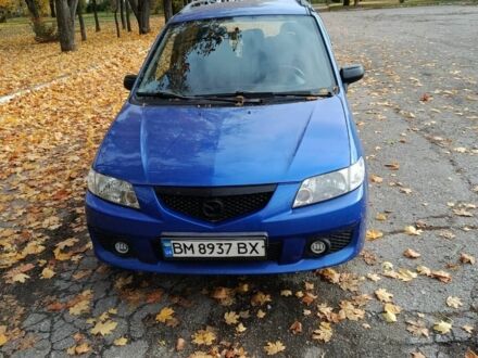 Синий Мазда 2, объемом двигателя 1.8 л и пробегом 318 тыс. км за 3000 $, фото 1 на Automoto.ua