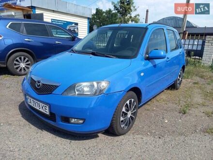 Синій Мазда 2, об'ємом двигуна 1.4 л та пробігом 133 тис. км за 4150 $, фото 1 на Automoto.ua