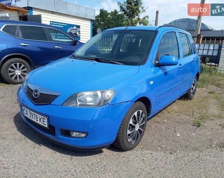 Синий Мазда 2, объемом двигателя 1.4 л и пробегом 133 тыс. км за 4150 $, фото 1 на Automoto.ua