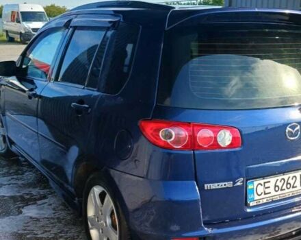 Синій Мазда 2, об'ємом двигуна 1.4 л та пробігом 255 тис. км за 3800 $, фото 1 на Automoto.ua