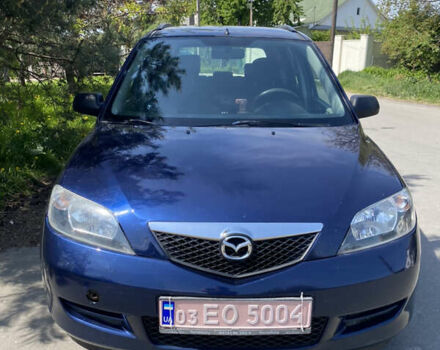 Синий Мазда 2, объемом двигателя 1.4 л и пробегом 225 тыс. км за 3950 $, фото 1 на Automoto.ua