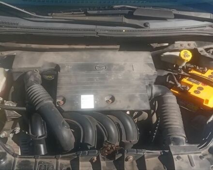 Синий Мазда 2, объемом двигателя 1.39 л и пробегом 176 тыс. км за 4800 $, фото 1 на Automoto.ua