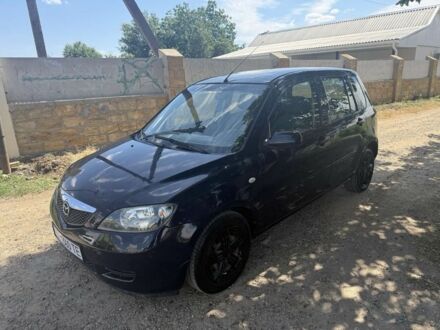Синій Мазда 2, об'ємом двигуна 1.4 л та пробігом 208 тис. км за 3850 $, фото 1 на Automoto.ua