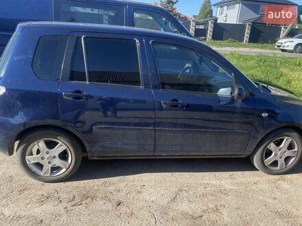 Синій Мазда 2, об'ємом двигуна 1.4 л та пробігом 177 тис. км за 4700 $, фото 1 на Automoto.ua