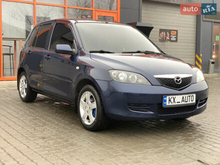 Синій Мазда 2, об'ємом двигуна 1.4 л та пробігом 185 тис. км за 5700 $, фото 1 на Automoto.ua