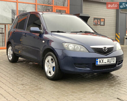 Синий Мазда 2, объемом двигателя 1.4 л и пробегом 185 тыс. км за 5700 $, фото 1 на Automoto.ua